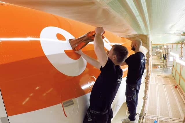 EasyJet said it has become the world’s first airline to use a lower-weight paint method to reduce its planes’ fuel burn (EasyJet/PA)