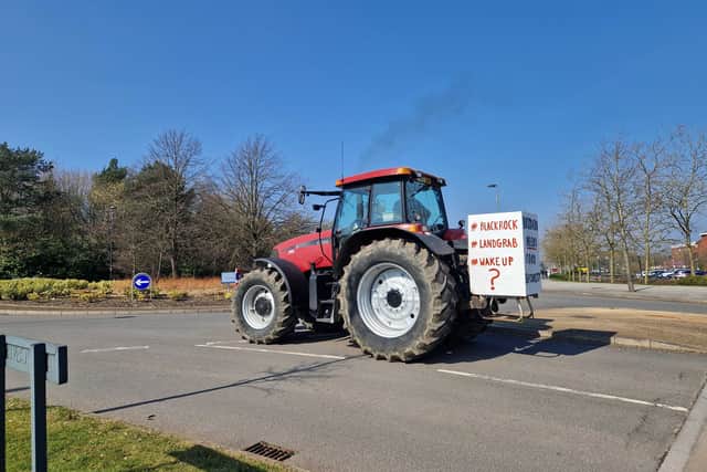 Farmers rode their tractors along Lawn Central outside Telford & Wrekin Council's base in March. 