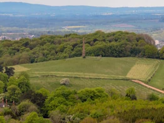 The view from Clent Hills of the Wychbury Obelisk at Hagley and towards the Black Country. Credit: Andy James