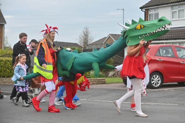 St George's Day Parade in Great Wyrley, organised by the Carnival committee, and finishing with a fete at Harrisons Club.