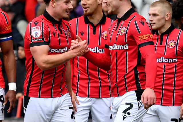 Connor Barrett celebrates Walsall's opening goal.