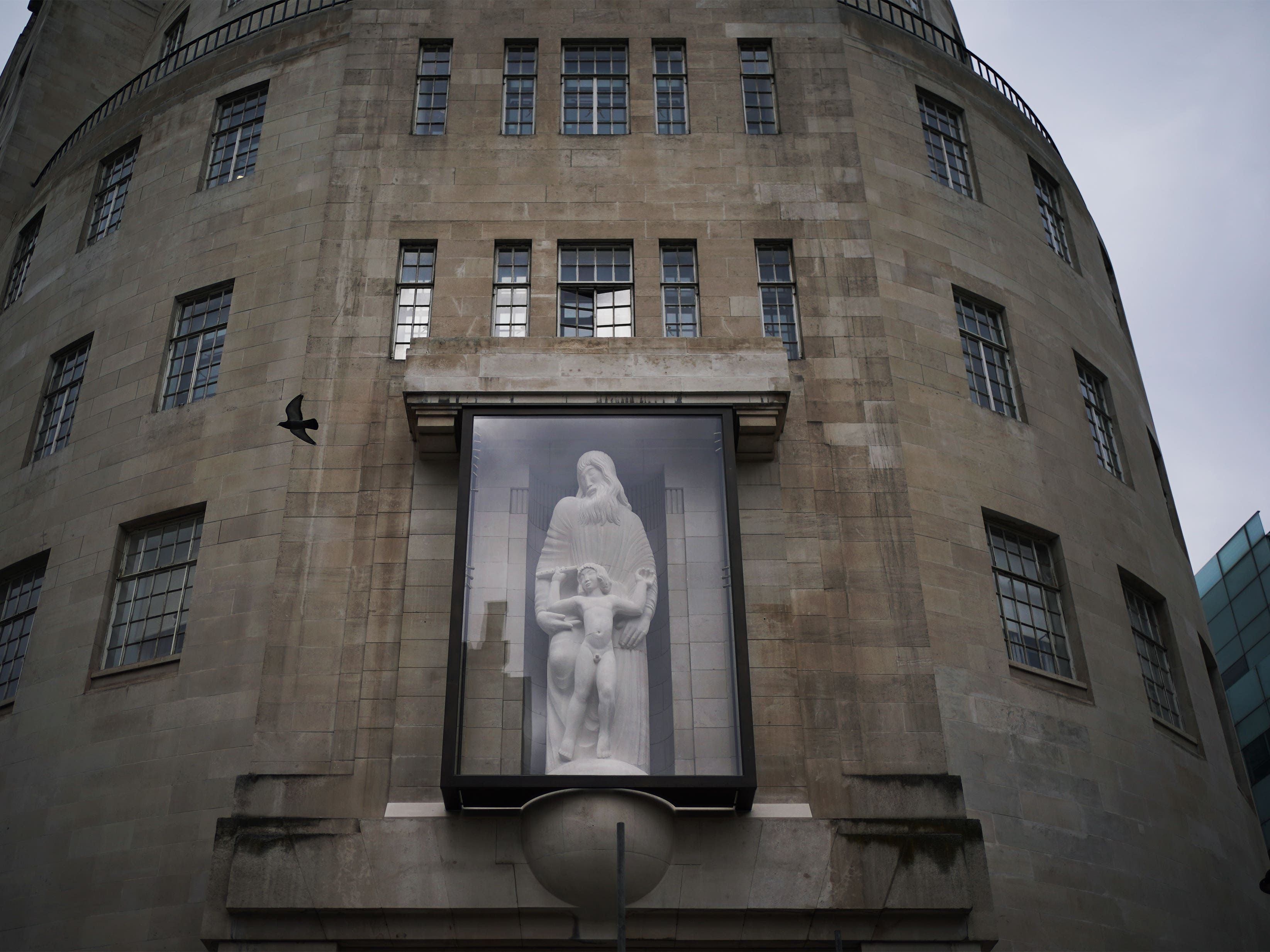 Controversial statue outside BBC headquarters goes back on display
