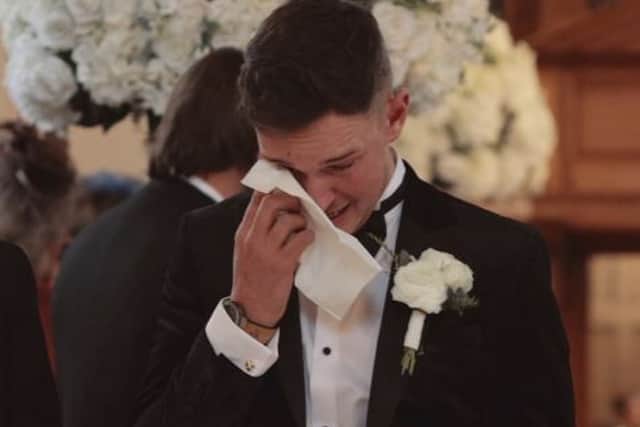 A groom becomes emotional on hearing a sweet wedding day message from his young daughter.
