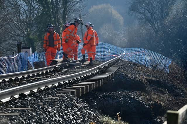 Engineers inspect the extent of the damage.