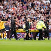 Wolverhampton Wanderers' Yerson Mosquera leaves the pitch on a stretcher 