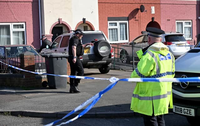 Police at the scene of the shooting