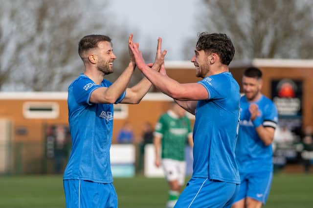 Lichfield City’s James Wilcock, left, celebrates his goal with Jamie Spiers. Photo: Jim Wall
