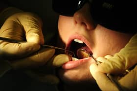 A person receives dental care
