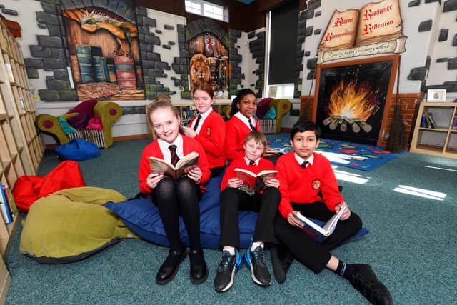 Pupils reading in the school's library