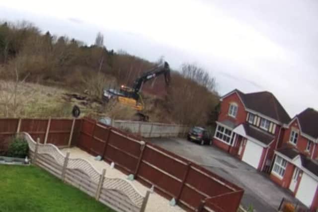 Machine clearing the Rattlechain land.