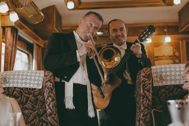 The in-house jazz band entertains passengers