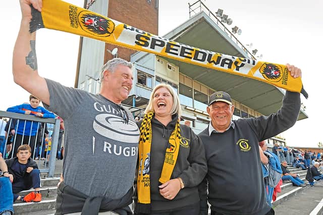 Fans (left-right) Ron Chadbone and Lynn Chadbone, both of Stourbridge, with Keith Couldrey, of Dudley.