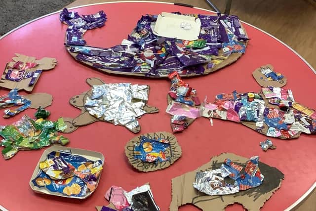 Artwork created by our children showing plastic usage to promote recycling.