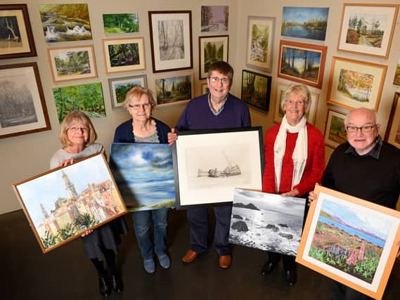Sandra Gould, Margaret McAtominey, David McGuire, Pat Hoskisson and Ken Worley, from Walsall Society of Artists get set for their exhibition at New Art Gallery, Walsall