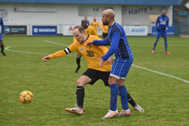 Jordan Mitchell takes on James Chambers during the match
