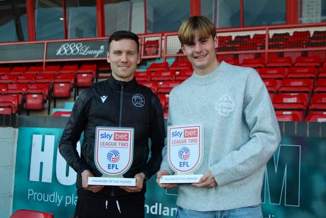 Nathan Lowe with his League Two player of the month award for December. (Image by Walsall FC/Owen Russell)