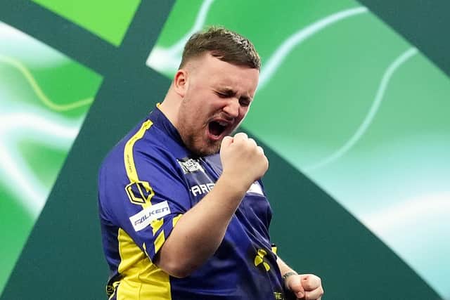 Luke Littler has become the youngest ever world champion (Zac Goodwin/PA)