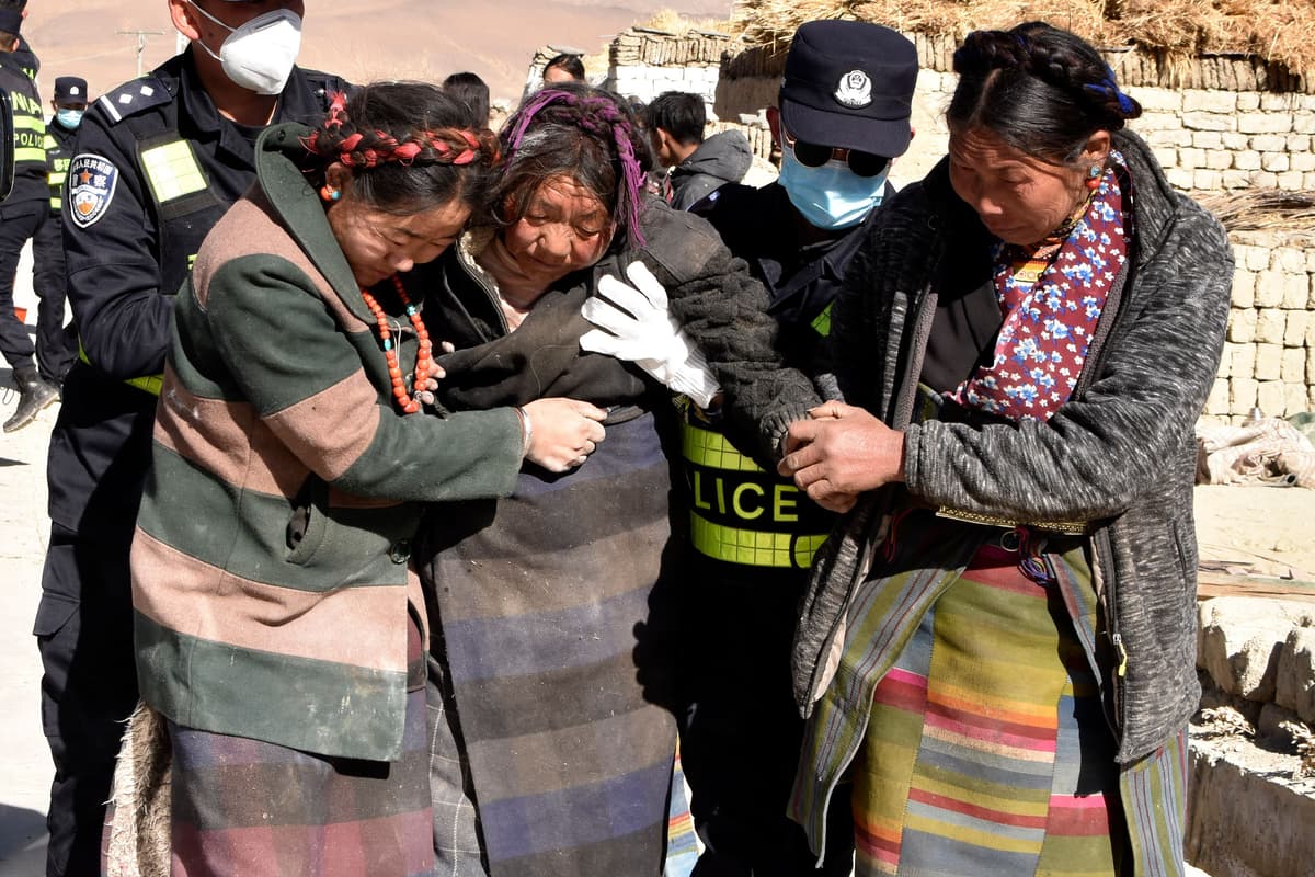 Survivors Rescued Rescue workers brave cold in search for earthquake survivors