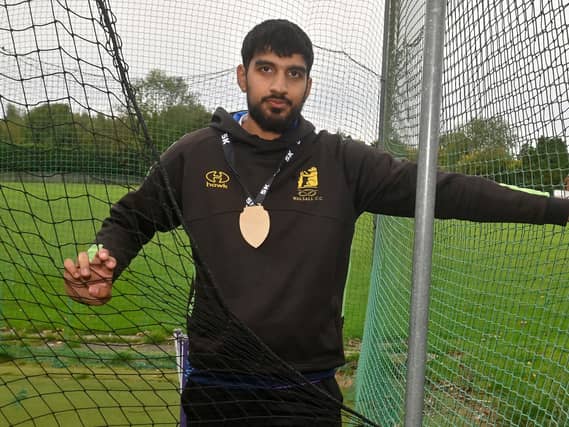 Hashim Iqbal with some with the damaged netting in the practise alley