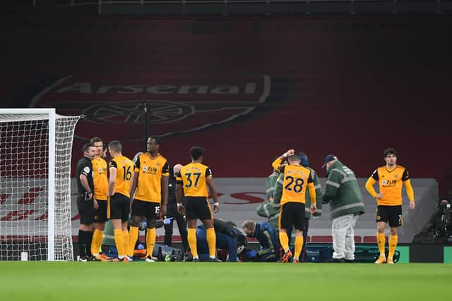 Raul Jimenez of Wolverhampton Wanderers lies injured receiving treatment with a head injury and is stretchered off the pitch. (AMA)