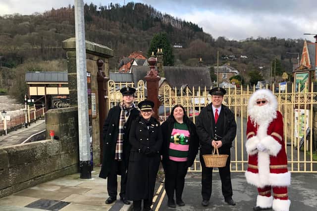 The team from the heritage railway giving out chocolates on December 8.