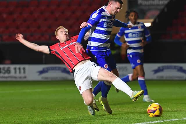 Danny Johnson stretches for a cross.