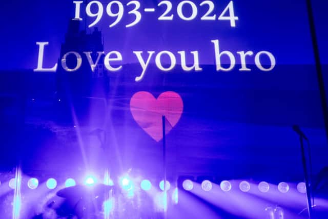 A written tribute to Liam Payne appears onscreen during Zayn's performance at O2 Academy Leeds on November 23, 2024 in Leeds, England. (Photo by Andrew Benge/Getty Images for ABA)