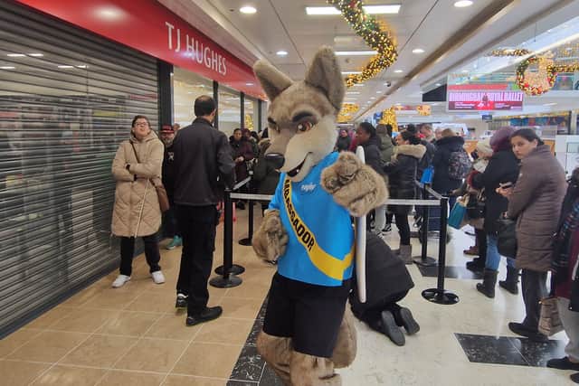 Claude - Wolverhampton's mascot - was there to welcome locals and help cut the ribbon.