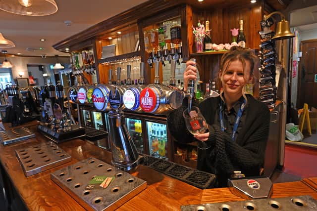 Brodie Gibbons pours one of the many popular drinks at the Chestnut Tree
