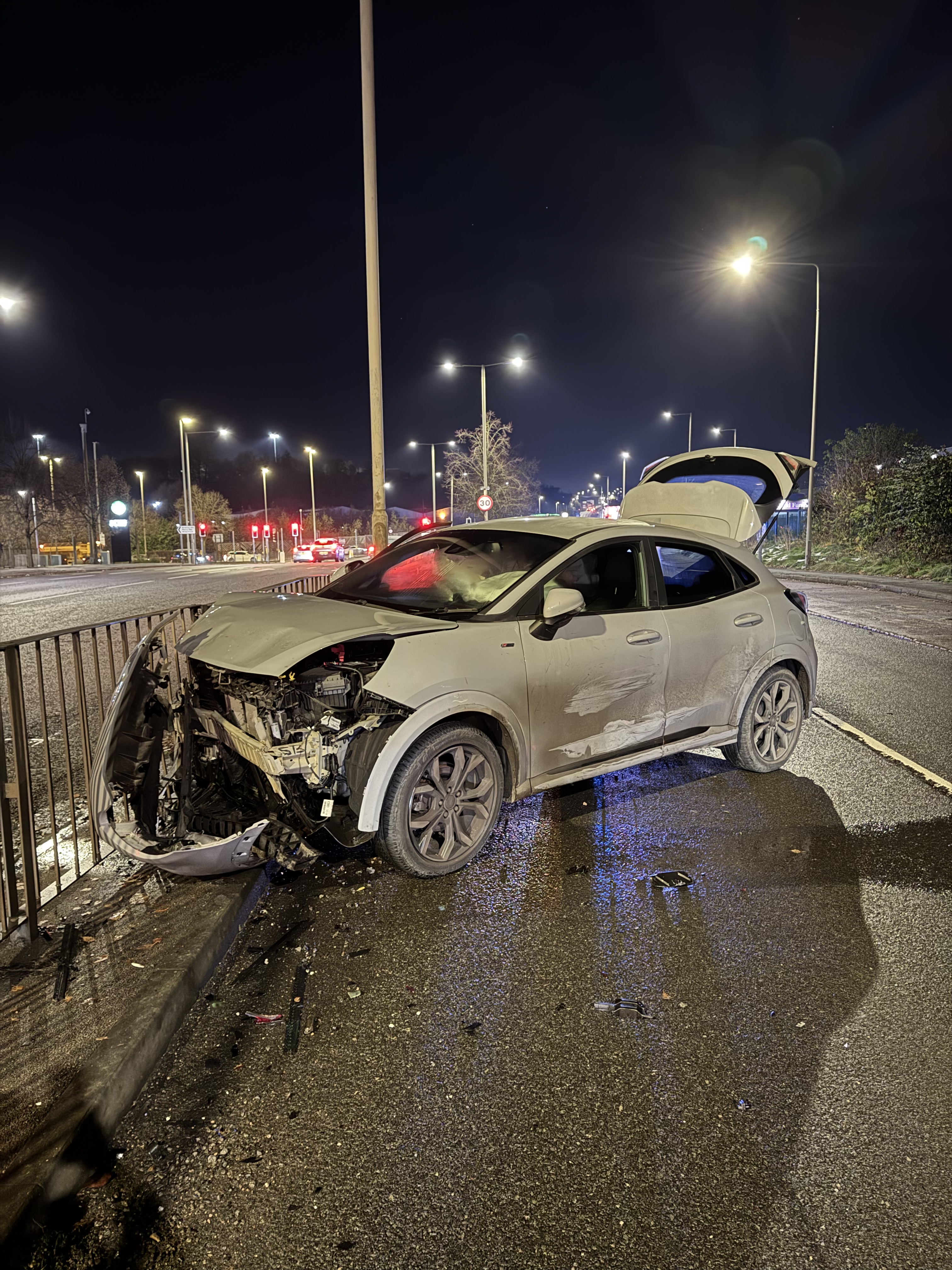 Man arrested after crashing stolen car in pursuit