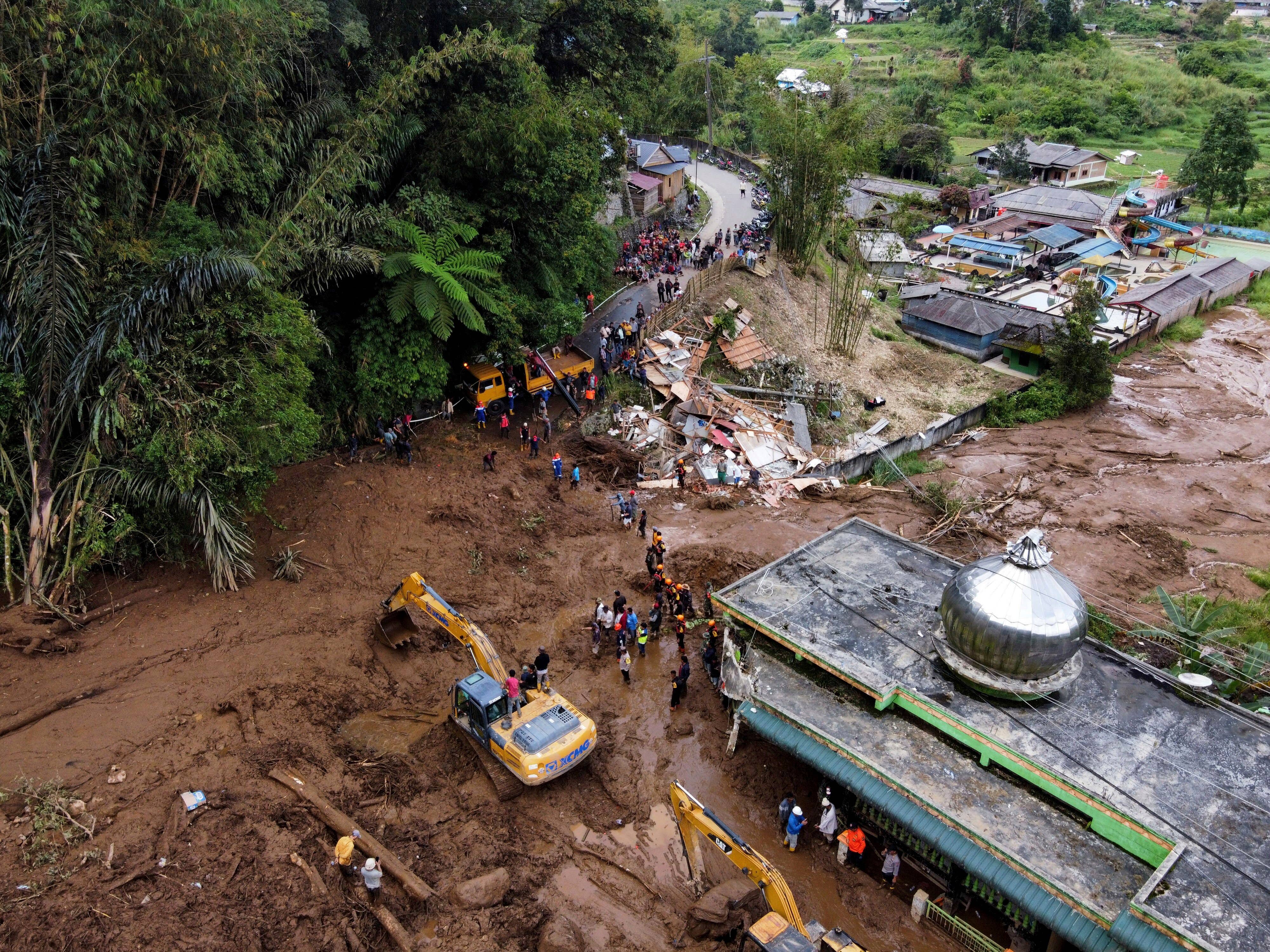 Rescuers recover 20 bodies from flash floods and landslides on Sumatra
