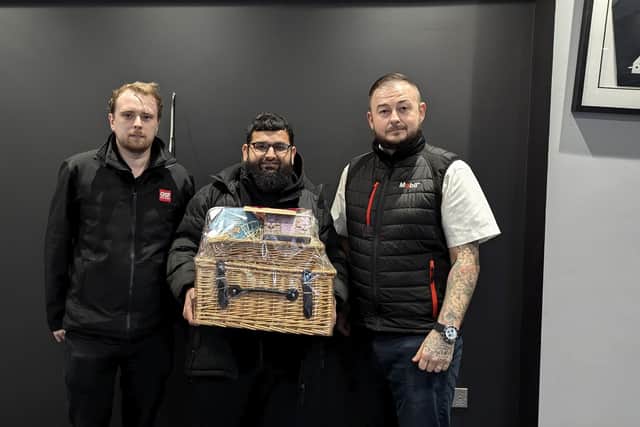Naz is presented with his hamper. (L-R) Daniel Green (GSF Walsall Branch Manager); Nawaz 'Naz' Arslan (Quick Fix Auto); Adam Fellows (GSF Birmingham Regional Manager)