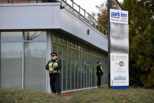 Officers could be seen surrounding the hotel while an investigation took place nearby