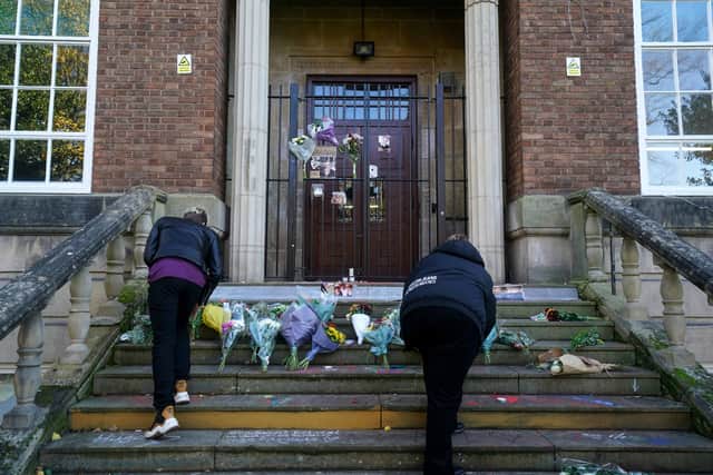 Flowers were left on the steps of Shrewsbury College. Photo: Jacob King/PA Wire