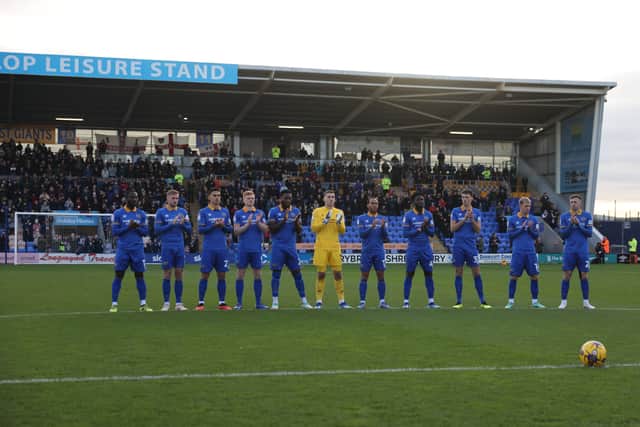 Shrewsbury Town players observed a minute's applause in honour of Jevon Hirst, Harvey Owen, Wilf Fitchett and Hugo Morris