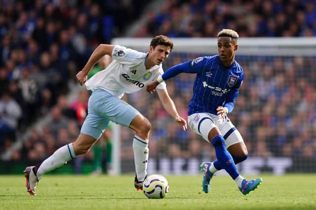 Aston Villa's Pau Torres (left) and Ipswich Town's Omari Hutchinson