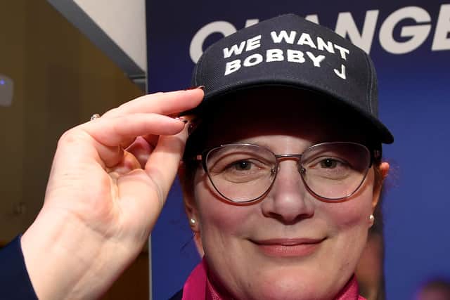 Helen Mayer proudly wears her "We want Bobby J" hat on Robert Jenrick's campaign stand