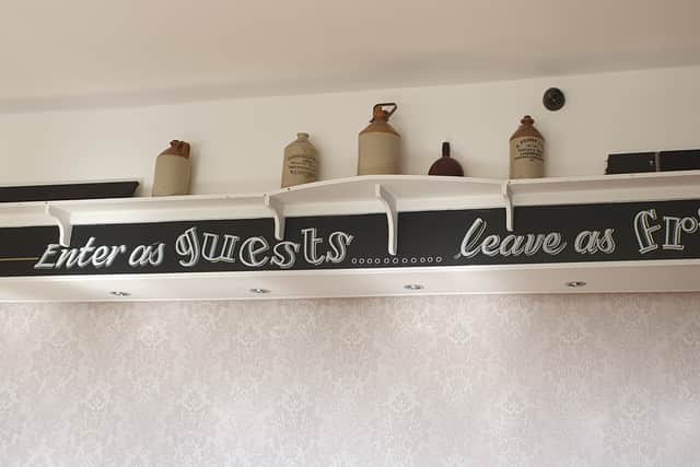 The pub has a motto about being a friendly place for all