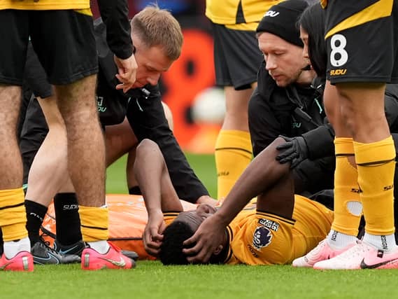 Wolves Injuries Wolves defender due for scan amid fears of serious knee injury