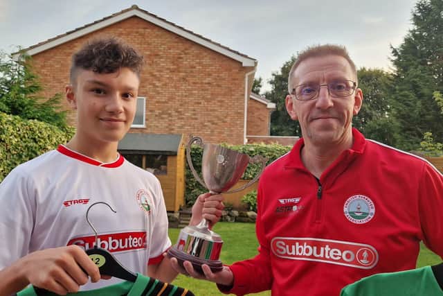 Justin and son Alex (left) have been playing Subbuteo together for almost a decade