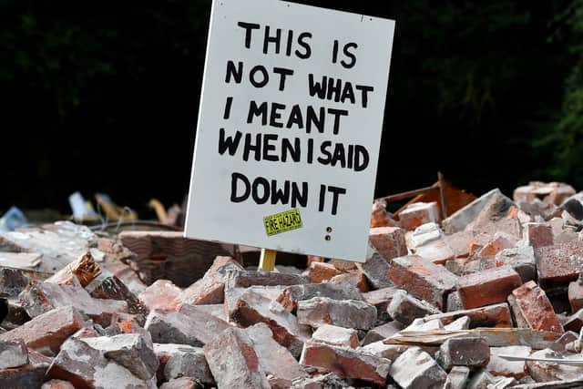 DUDLEY COPYRIGHT MNA MEDIA TIM THURSFIELD 11/08/23.People gather at the Crooked House site to express their hurt and anger..