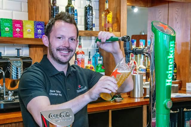 Ray Whelan behind the bar at The New Talbot