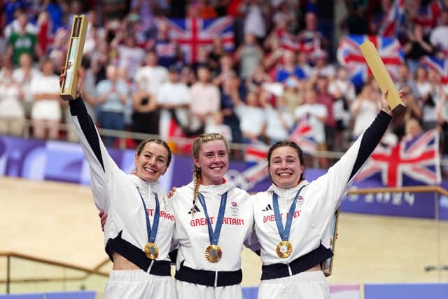 Great Britain's Katy Marchant, Emma Finucane and Sophie Capewell celebrate with their gold medals won in the Women's Team Sprint finals at the National Velodrome, Saint-Quentin-en-Yvelines, on the tenth day of the 2024 Paris Olympic Games in France. Photo: David Davies/PA Wire