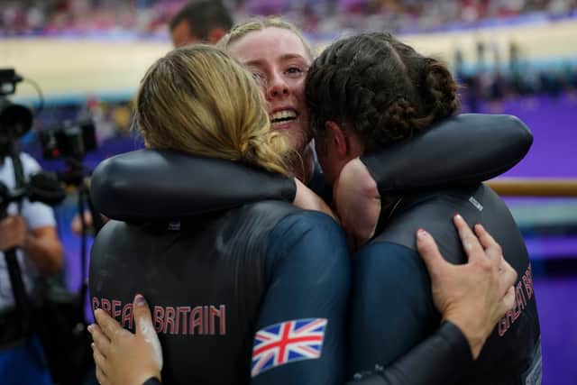 Emma Finucane of Team Britain, centre, celebrates with teammates winning the gold medal. Photo: AP/Thibault Camus