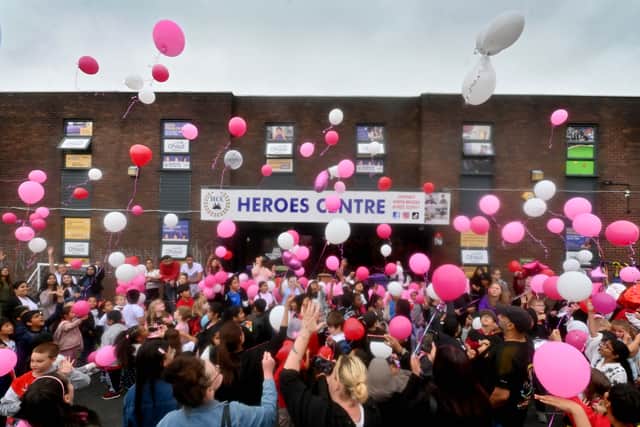 Hundreds of balloons were let off into the sky