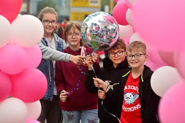 L-R; Jaime, Alexa, Charley and Tyler, let off a special balloon to remember their dad, Simon, who passed away eight years ago due to cancer
