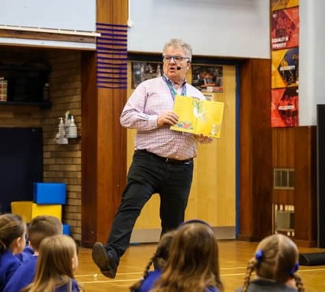 Children enthralled at a poetry session