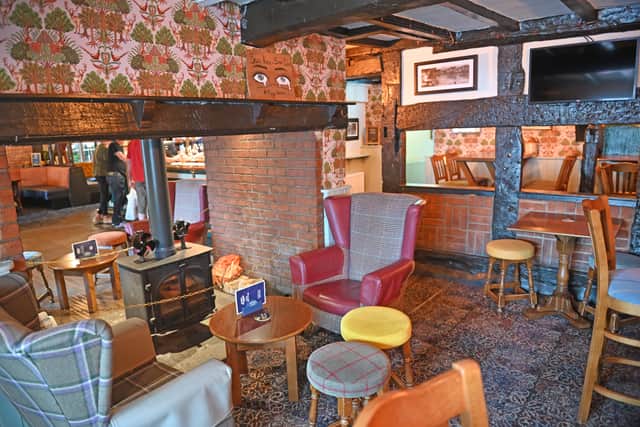 There are fire places and warm spaces for people throughout the pub