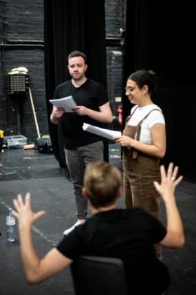 Performers rehearsing in preparation for their Fringe festival debut