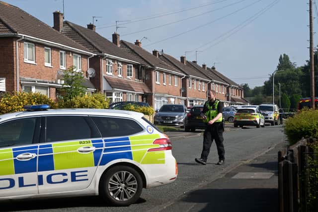 Police at the scene on the day of the blaze